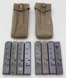 8 Uzi 25 round magazines and 2 canvas double mag pouches.