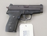 Sig Sauer P228 semi-automatic pistol.