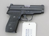 Sig Sauer P229 semi-automatic pistol.