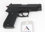 Sig Sauer Model P220 semi-automatic pistol.