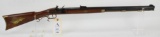 Thompson Center Hawken flintlock rifle.