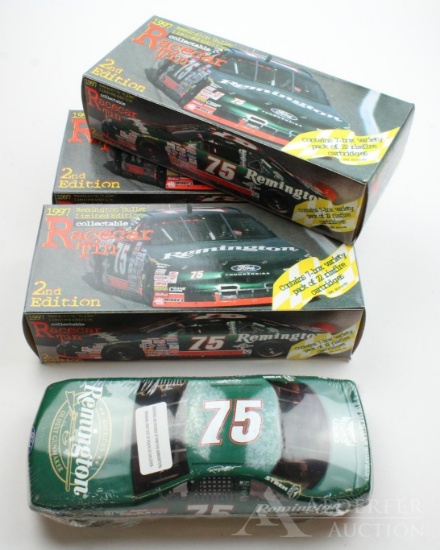 Lot of three 1997 Remington race car tins with ammo