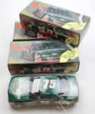 Lot of three 1997 Remington race car tins with ammo