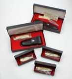 Five Schrade Scrimshaw series knives