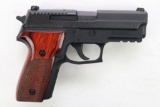 Sig Sauer P229 semi-automatic pistol.