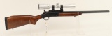 New England Firearms Pardner single shot rifle.