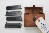 Leather cartridge case with 4 - 8 round P38 magazines.