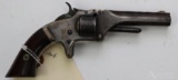 Smith & Wesson #1 spur trigger revolver.