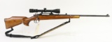 Mauser sporterized bolt action rifle.