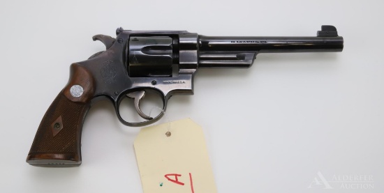 Smith & Wesson Hand Ejector double action revolver.