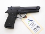 Beretta 92FS semi-automatic pistol.