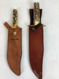 2 Bear and Son fixed blade knives with leather sheaths