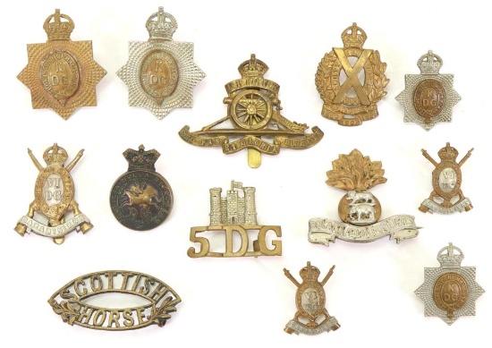 Grouping of British Military Hat Badges, Collar Badges and Shoulder Brass