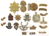 Grouping of British Military Hat Badges, Collar Badges and Shoulder Brass