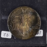 1994 - SILVER EAGLE - TONED GOLDEN