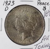 1923-D PEACE DOLLAR - AU TONING