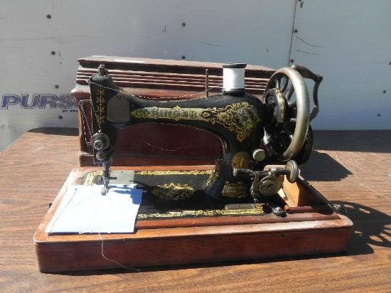 Antique singer sewing machine with wooden case