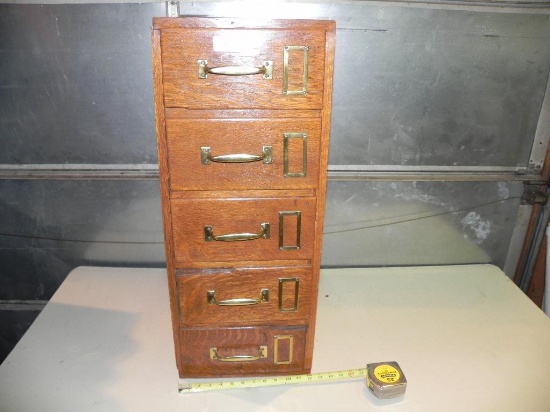 5 drawer oak cabinet full of harware