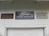Ford authorized dealer sign with 2 vintage colorado plates