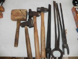 Blacksmith tongs and hammers