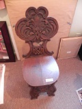 Ornate carved wood chair