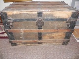 Early wood and metal trunk