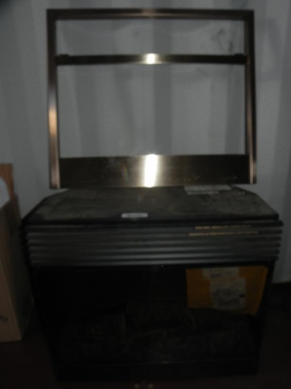 Chauffe-air fireplace air heater.