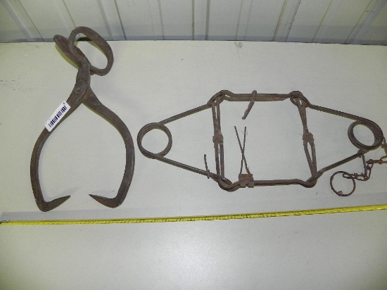 Antique trap and ice tongs.