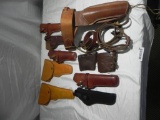 Leather holsters and slings