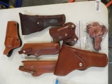 Revolver and pistol holsters