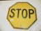 1940's vintage yellow metal stop sign made of heavy iron, 24x24x