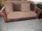 Leather Master King hickory sofa with 4 pillows.