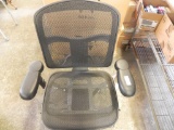 Adjustable black modern office chair.