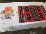 Simplex Beadwork loom with Indian seed beads and small southwestern rug.