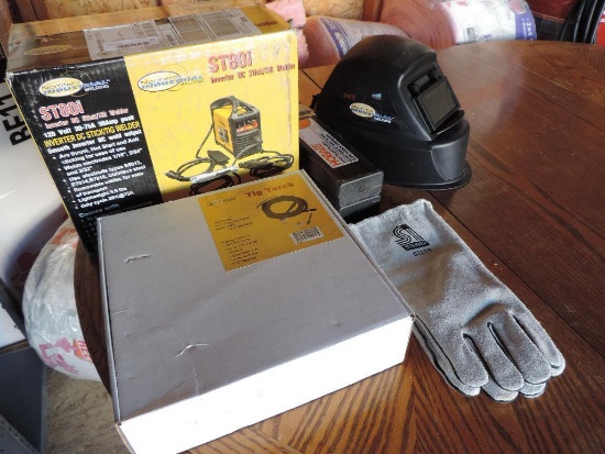 Northern industrial ST80I welder (new in box) with tig torch, 2 boxes of Hobart welding rods, shade