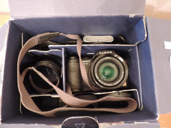 Lumix FZ7 camera with box and manual (untested).