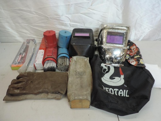 Welding gear lot. Redtail welding helmet with bag, K06256 welding helmet, gloves, leather bag, rods