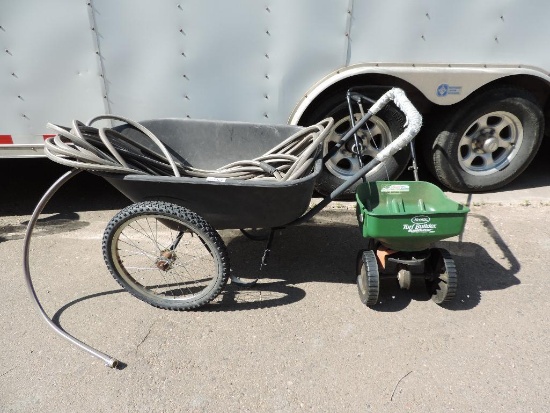 Gardening lot with big tire wheel barrow, scotts spreader and 50' hose.