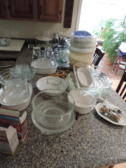 Huge lot of kitchen glassware and pans.