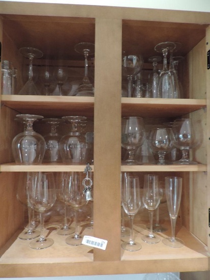 large lot of wine & drinking glasses.