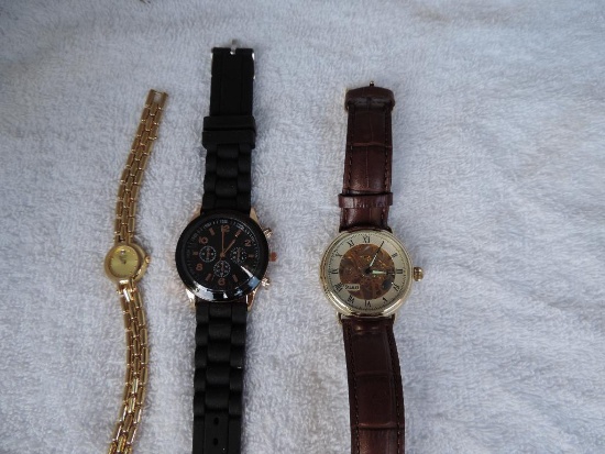 Stauer watch & Bulova women's watch.