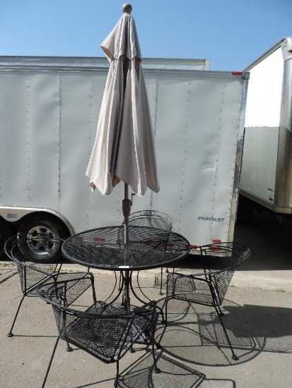 Nice black metal 42x30" patio table with 4 chairs, umbrella and cast iron umbrella base.