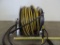 Hannay hydrolic commercial hose reel with 100' hose. Model 1011407
