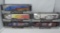 5 limited edition 1/64 scale racing transporter die cast trucks.