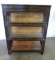Glass doored bookcase.