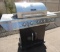 Nexgrill stainless steel gas BBQ with propane tank (Untested).