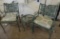 Cast metal patio chairs and glass top end table set.