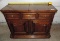 Oak server with fold out bar top.