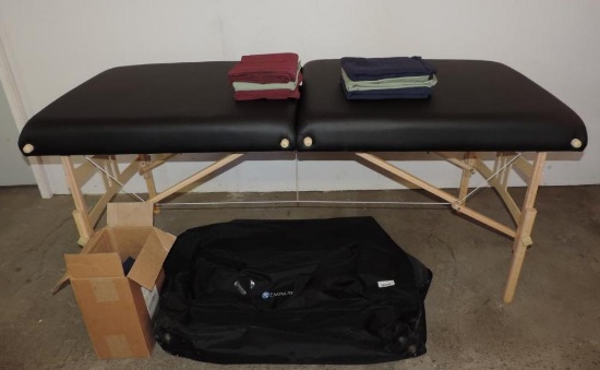 Earth Lite Professional portable massage table in excellent condition with head rest and 6 sets of