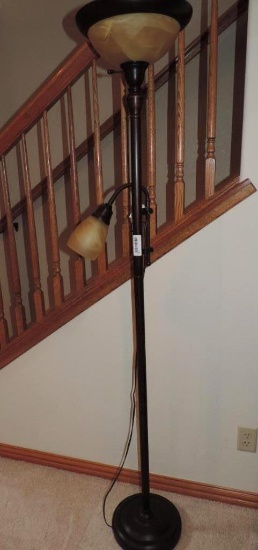 Bronze finish floor lamp with glass shades.